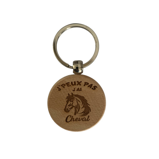 "Porte-clés rond en bois de bambou naturel gravé J'peux pas j'ai cheval avec motif tête de cheval, diamètre 3,5 cm, avec anneau métallique, photographié sur fond blanc"